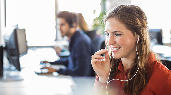 woman-talking-through-headphones